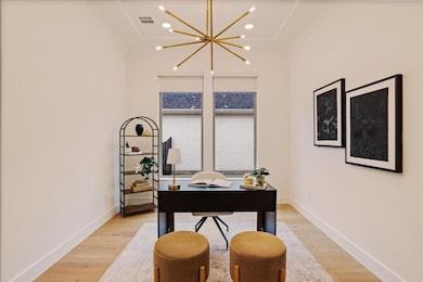 Private office space with light wood-type flooring, a chandelier, and recessed lighting