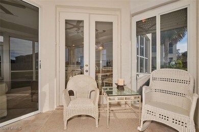 Sunroom / solarium featuring ceiling fan