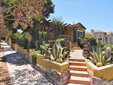 Corner view of home with California friendly plant