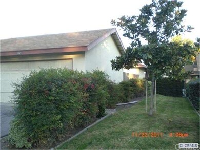 SIDE VIEW OF THE UNIT WITH 2 CAR DETACHED GARAGE
