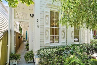 Covered formal entry with irrigated planters