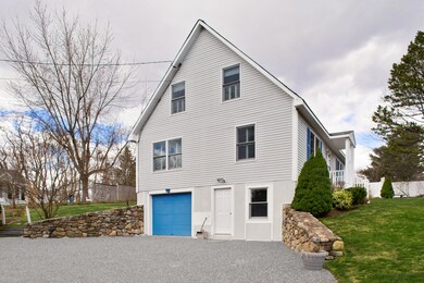 Parking area with 1-car garage