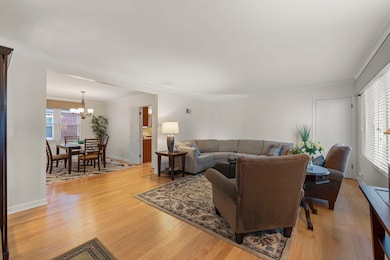 Spacious and open living room with hardwood floori