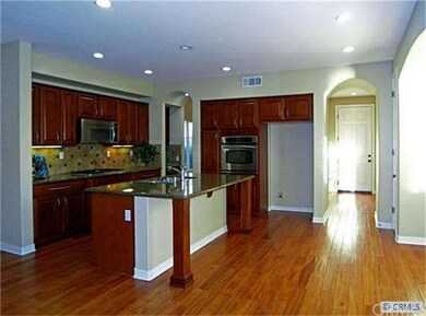 Kitchen includes granite and stainless steel appli