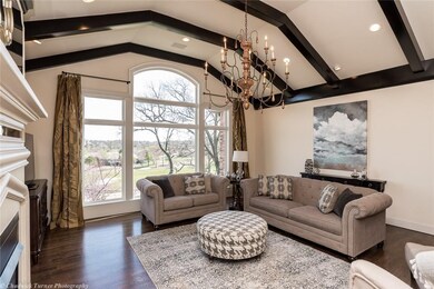 Beamed Ceiling and a Wall of Windows.