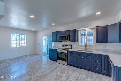 Kitchen, dining nook & slider to patio