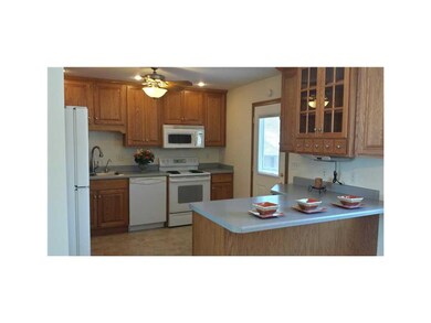 Kitchen. Updated Kitchen with Beautiful Oak Cabine