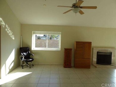 Dining area with ceiling fan overhead showing fire