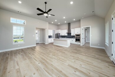 Positioned as the heart of the home, the large fam
