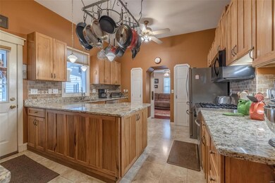 Fully equipped kitchen has tons of storage and ple