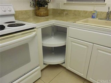 Corner revolving storage