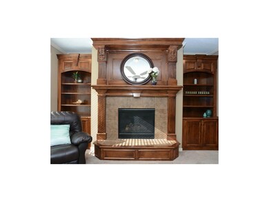 Custom wood trim and built in bookshelves.