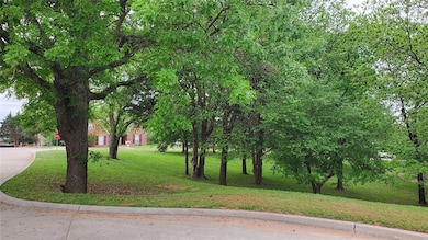 View of half acre corner lot from Eagles Nest. Cou