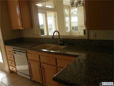 Kitchen with stainless steel dishwasher & granite 