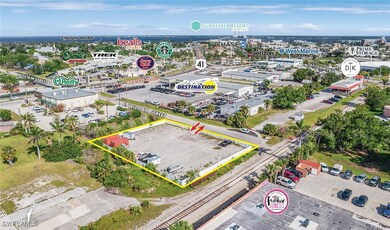 Aerial view of property and surrounding area with
