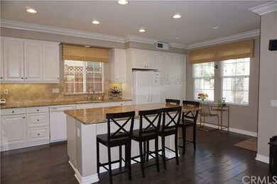 Kitchen with oversized granite counter
