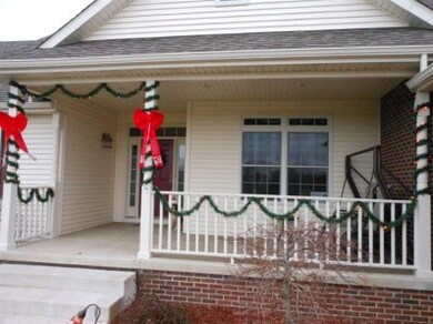 Covered front porch greets you.