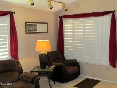 Living Room has natural & track lighting