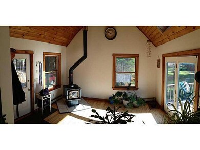 Foyer. Breezeway with woodstove,...