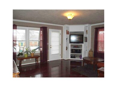 Great Room. wood floors, built-ins,open to kitchen