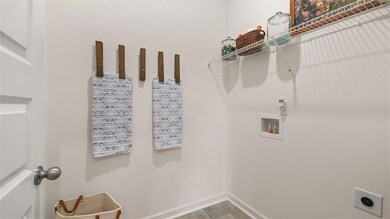 Clothes washing area with washer hookup, hookup fo