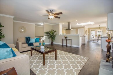 Great Room open to kitchen with New Wide Plank Har