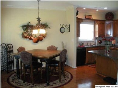 Eating area in the kitchen, bar, hardwood floors, 