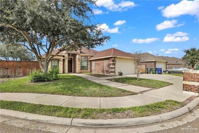 View of front facade featuring a garage