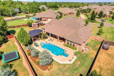 View of swimming pool featuring a lawn, central AC