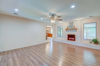 Living opens to kitchen and dining.