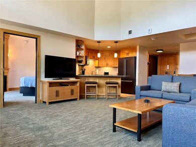 The bedrooms are separated by the parlor room for