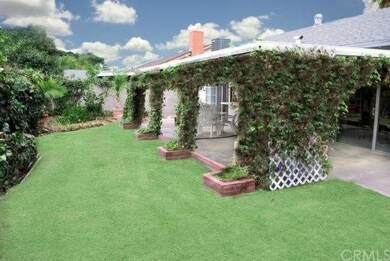 Back yard overlooking covered patio