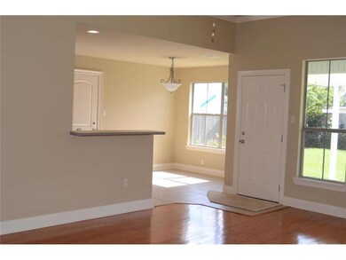 Living Room. Open floor plan with breakfast bar.