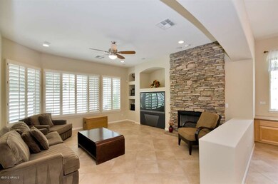 Family Room with Stacked Stone Fireplace