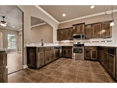 Exterior Front. Kitchen.  Granite counters cabinet underlighting