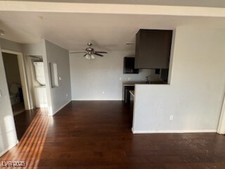 Unfurnished living room with wood finished floors,