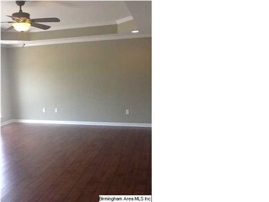 Hardwood laminate floors in main living areas.