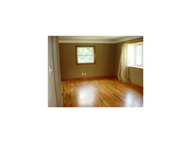 Living Room. HARDWOOD FLOORS AND TONS OF NATURAL L