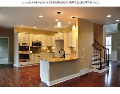 Exterior Front. Gorgeous kitchen offers tile backs