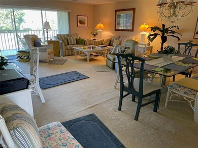 Dining space with a notable chandelier and light c