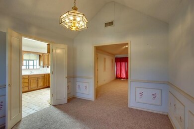 Formal dining room, with double doors to the kitch