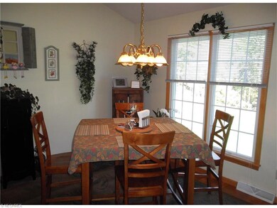 Beautiful dining area overlooks back yard.