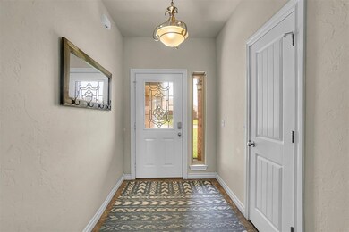 Entryway featuring baseboards