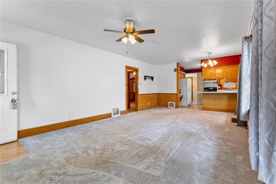 Living room and view of kitchen
