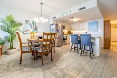 Dining room with light hardwood / wood-style floor
