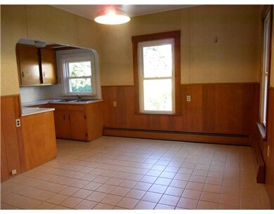 Kitchen. Large area with quarry tile floors.  Side