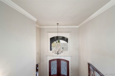 Timeless fixtures adorn the entry and throughout t