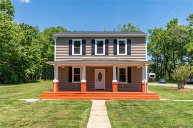 View of front of property featuring a front lawn