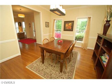 Dining Room - Bright formal dining room with hardw