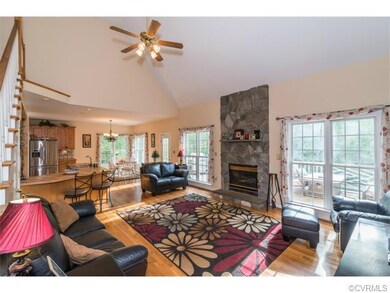 Massive Great Room with Stone Fireplace, Tons of W